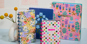 Image of four new Happy Planners in various sizes and designs