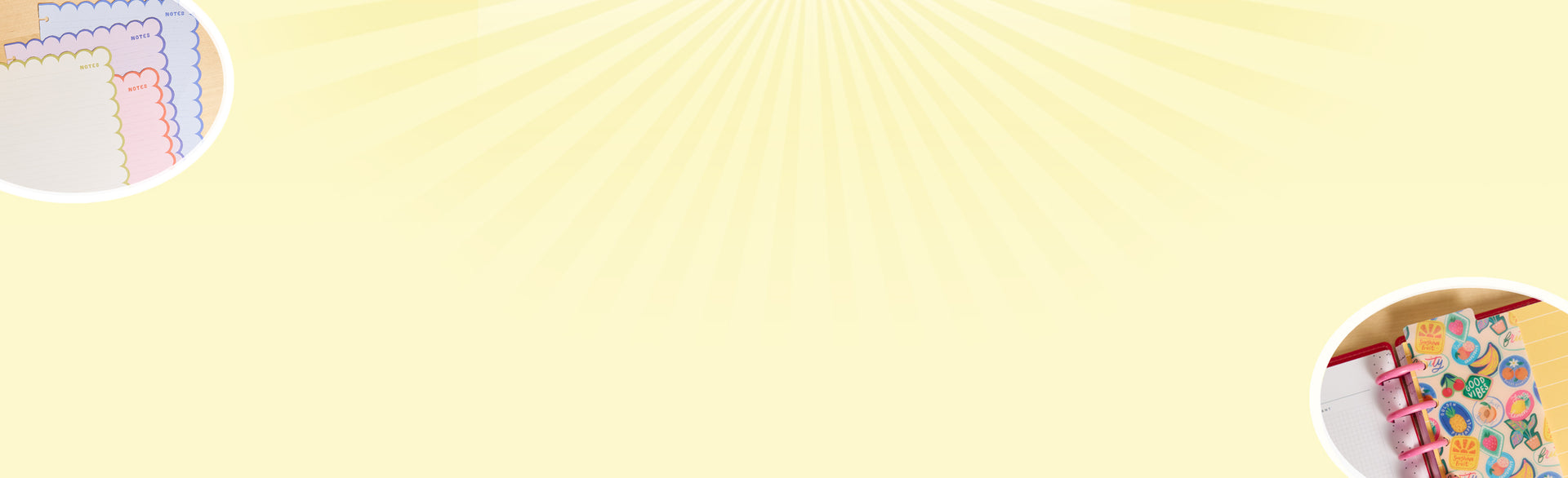 Close-up of pastel-colored planner discs on a yellow background with subtle sunburst rays, accompanied by partial views of a sticker sheet and a colorful disc-bound planner page.